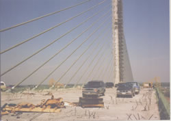 Custom Cantilever Work Platforms for Finishing Concrete & Installation of Delta Frames on Precast Segmental Box Girder Bridges