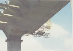 Custom Cantilever Work Platforms for Finishing Concrete & Installation of Delta Frames on Precast Segmental Box Girder Bridges