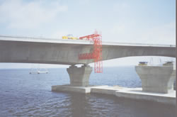 Custom Cantilever Work Platforms for Finishing Concrete & Installation of Delta Frames on Precast Segmental Box Girder Bridges